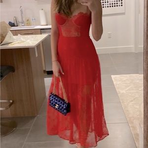 Red lace bustier dress with sheer bottom